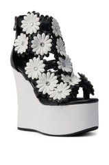 AZALEA WANG FLOWER EMBELLISHED WEDGE SANDAL IN BLACK