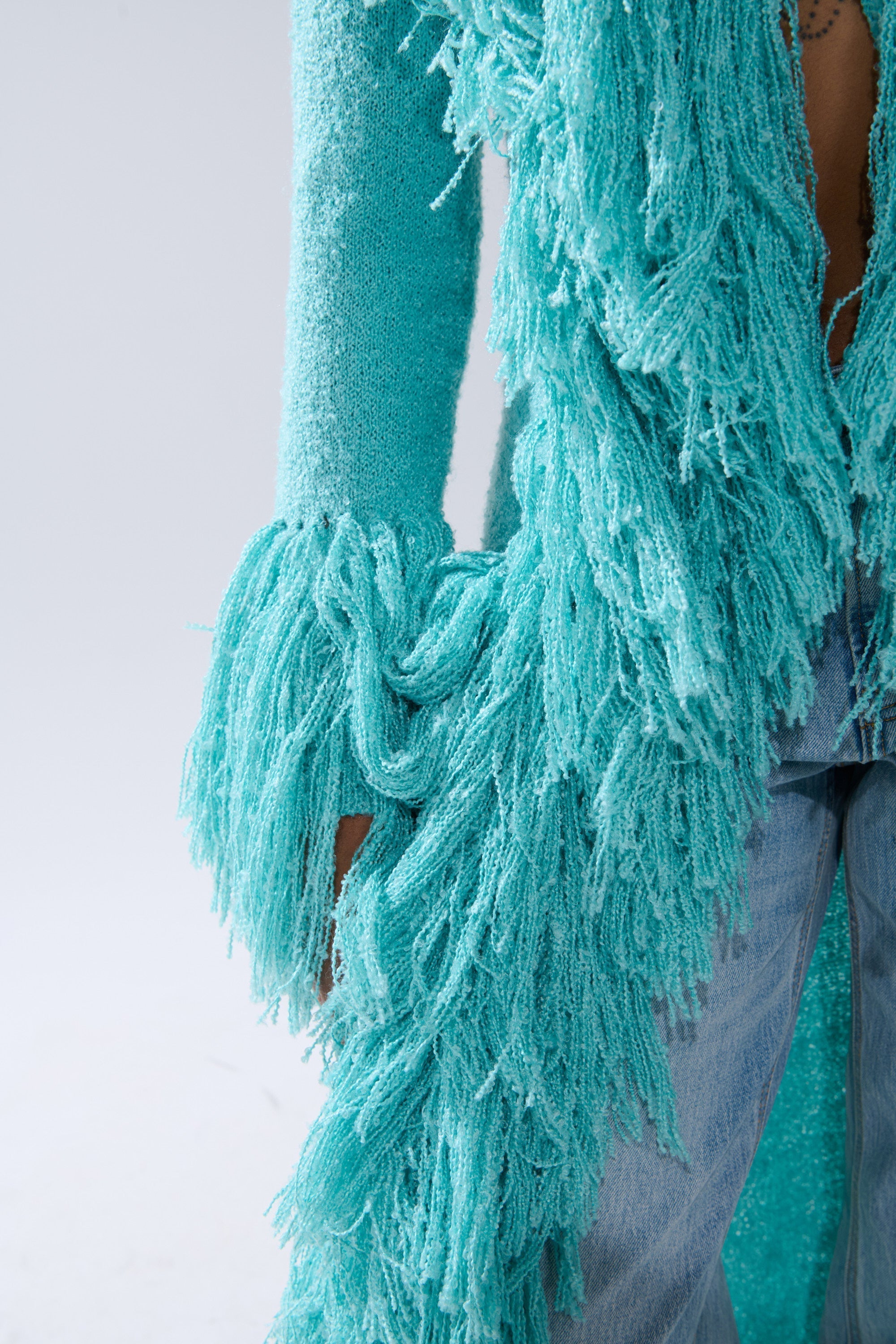 BURRR IT'S COLD OUTSIDE FRINGE OVERSIZED SWEATER IN TURQUOISE